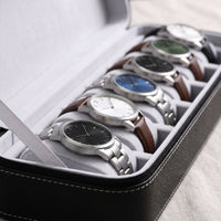 Étui de voyage pour 6 montres Voyageur noir, gros plan sur les coussins et les montres