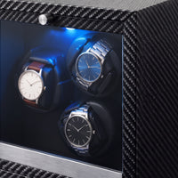 Remontoir automatique pour 3 montres Galerie carbone, façade vitrée et texture carbone en cadrage serré